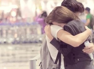 True-lovers-hug-each-other-as-they-say-goodbye-403x300